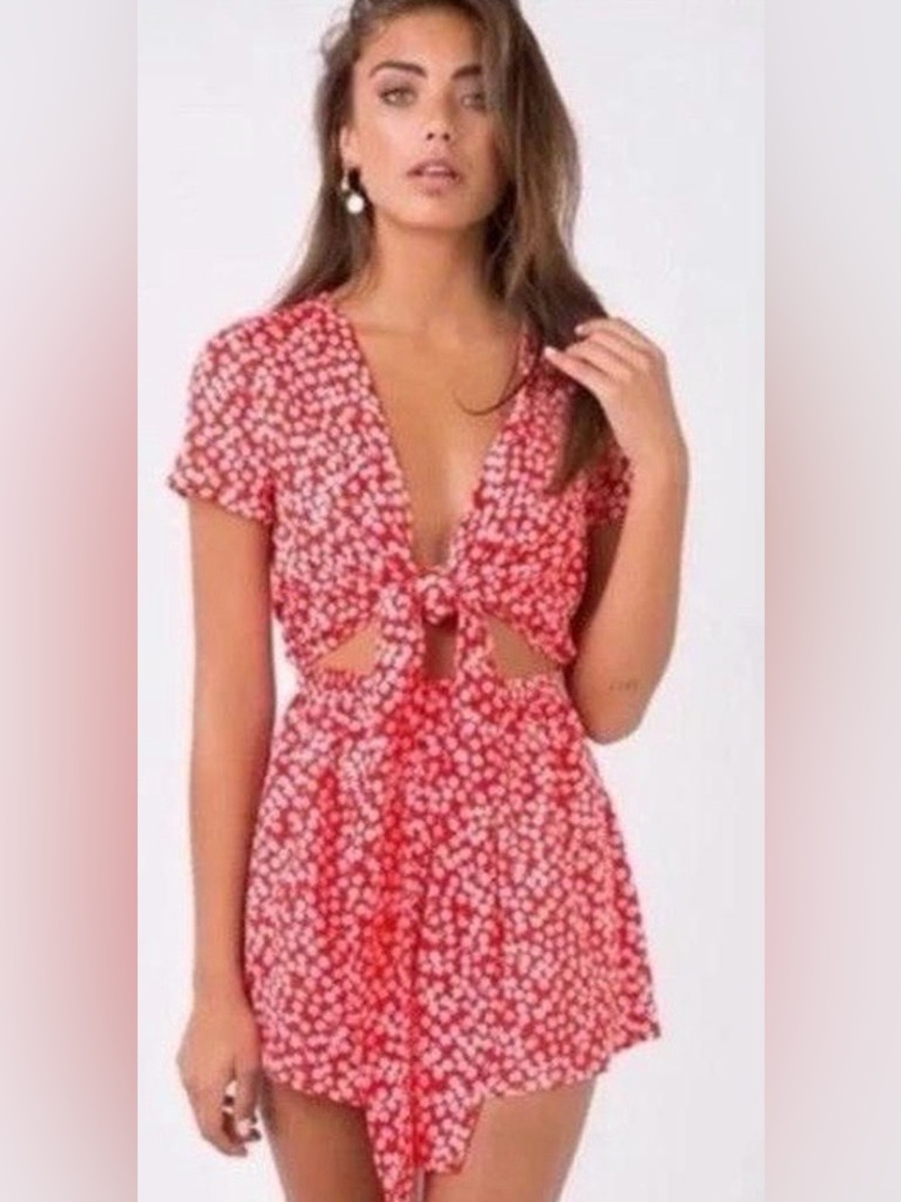 Polly tie- cut out romper. Red and white floral. Size small.